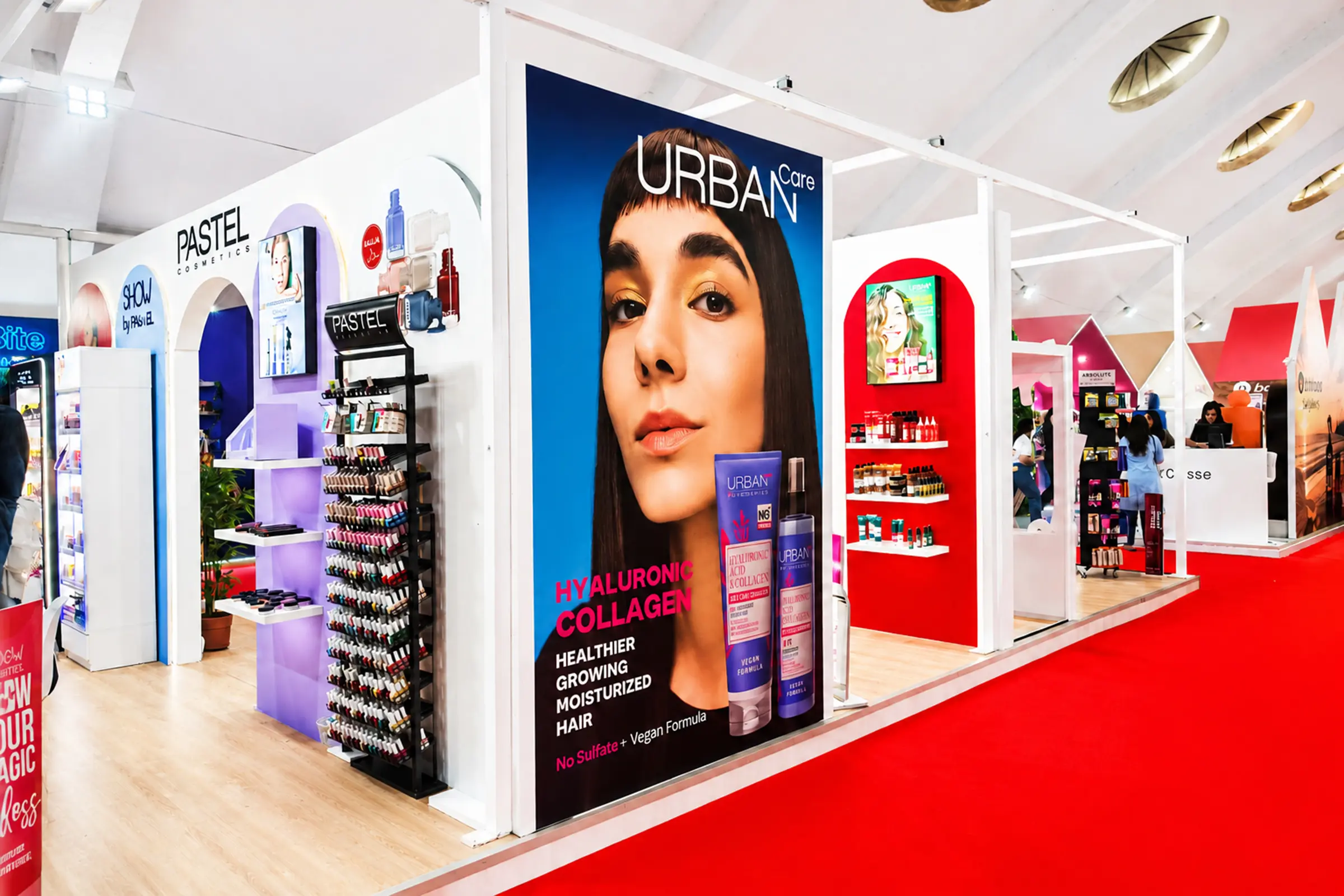 Stand Absolute NewYork, Pastel, Urbane Care, Coxir au Cosmetista Expo Casablanca 2026 , vue extérieure en angle, architecture moderne avec éclairage LED et espaces d’accueil professionnels 