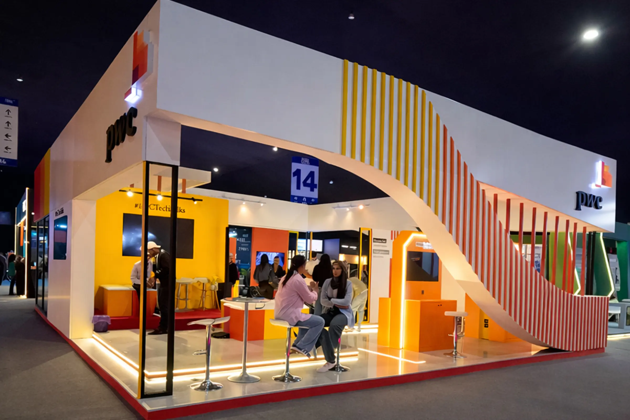 Vue intérieure du stand PWC au salon GITEX Africa Marrakech 2025, design contemporain, structure ouverte et zones de démonstration technologique