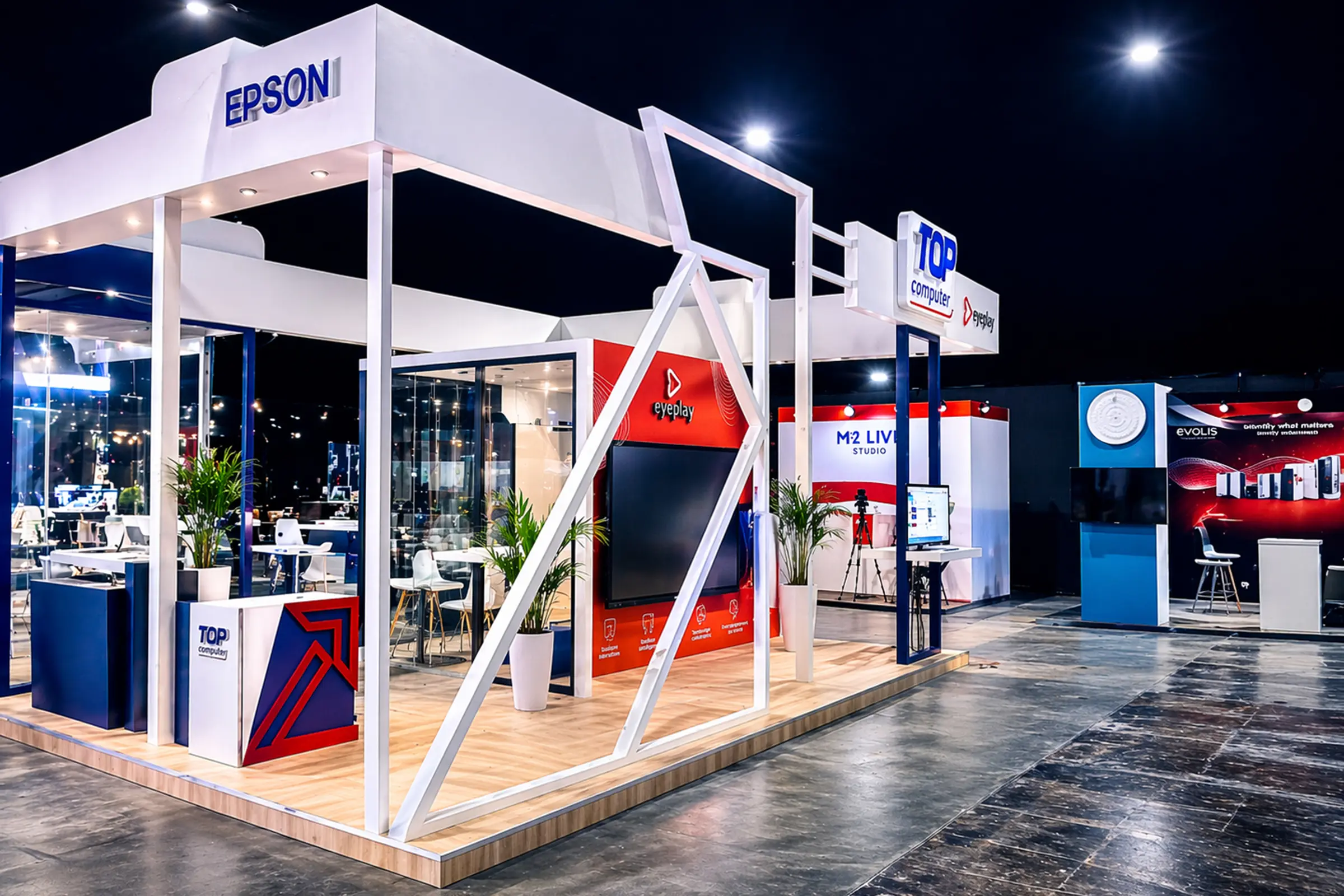 Vue face du stand Top Computer au salon GITEX Africa Marrakech 2026, design contemporain, structure ouverte et zones de démonstration technologique